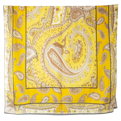 The Yellow Paisley Print Silk Scarf featuring a beautifully intricate paisley pattern design